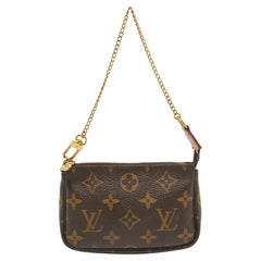 Louis Vuitton - Mini-pochette en toile avec monogramme