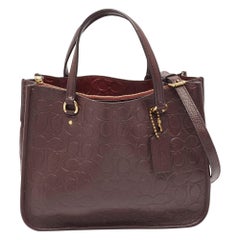 Coach Fourre-tout Tyler Carryall 28 caractéristique bordeaux en cuir gaufré