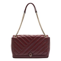 Borsa a tracolla Bvlgari in pelle trapuntata rossa con cabochon
