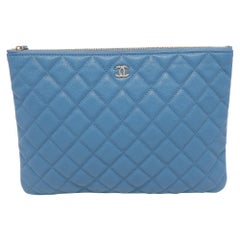 Chanel Blue Quilted Caviar Leather O Case Clutch