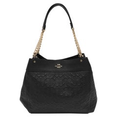 Borsa a tracolla Lexy in pelle nera goffrata di Coach