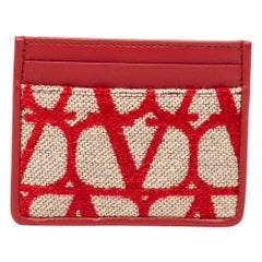 Tarjetero Iconographe Valentino de lona y piel rojo/beige
