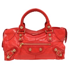 Tote Part One de Balenciaga en piel roja con herrajes gigantes