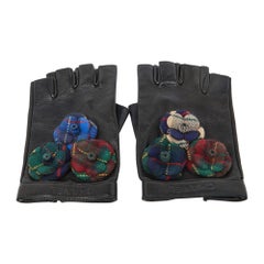 Gants Chanel noirs Camélia sans doigts en cuir