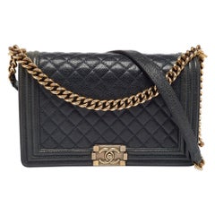 Chanel Navy Blue Quilted Caviar Leather New Medium Boy Flap Bag