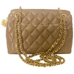 Vintage CHANEL brown caviar leather chain shoulder bag with golden CC mark motif