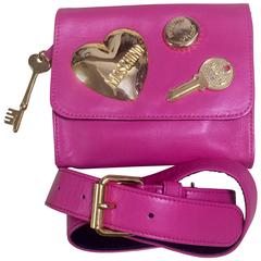 Retro MOSCHINO pink leather waist purse, fanny bag, clutch bag with gold motif