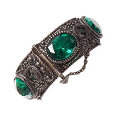 Brazalete GUCCI Alessandro Michele GG logo cristal verde antiguo bronce de cañón