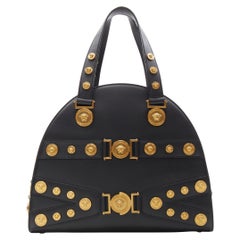 Bolso bandolera VERSACE 2018 Tribute 1992 oro Medusa tachuela bondage bowling