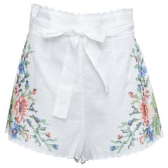 ZIMMERMANN Juliette, pantaloncini in lino bianco con ricamo floreale e cintura US2 XXS
