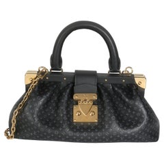 Louis Vuitton Clutch in pelle di vitello nera con Monogram Nanogram