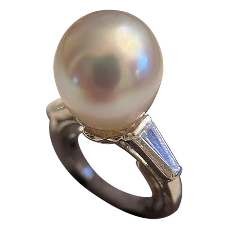 
Brand/Designer:	Cartier
Style:	Vintage
Materials:	Platinum, 18K Gold
Ring Size:	4.00
Hallmarks:	88453 Cartier
Total Weight (grams):	6.80
Body of the ring is Platinum
sizer is 18K
Ring size is approximate at size 4 
Mandrel size is 4.25 
Estimated