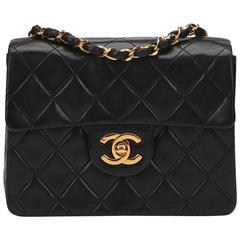 1980s Chanel Black Quilted Lambskin Vintage Mini Flap Bag