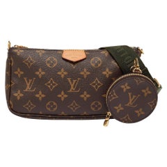 Louis Vuitton - Pochette Duo en toile Monogram Around the World