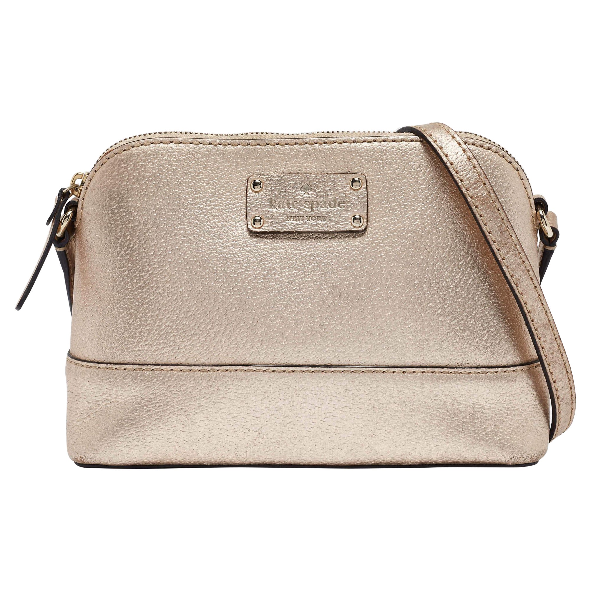 Bolso cruzado Kate Spade Wellesley Hanna de piel dorada en venta