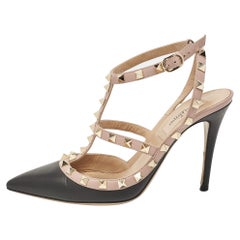 Bombas con correa al tobillo Rockstud de cuero negro/rosa polvoriento de Valentino Talla 37.5