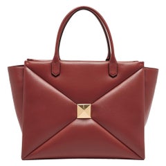 Valentino Tote con una borchia in pelle rosso mattone
