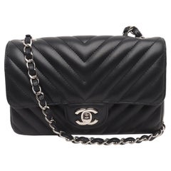 Chanel Classic Flap Mini Chevron Quilted Black Lambskin Silver Hardware