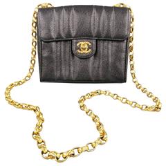 Vintage CHANEL Black & Gold Quilted Caviar Leather Gold Chain Mini Handbag