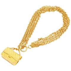 Vintage CHANEL golden multiple chain necklace with classic 2.55 bag charm. 4