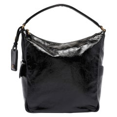 Yves Saint Laurent Multy Hobo aus schwarzem Lackleder in Schwarz