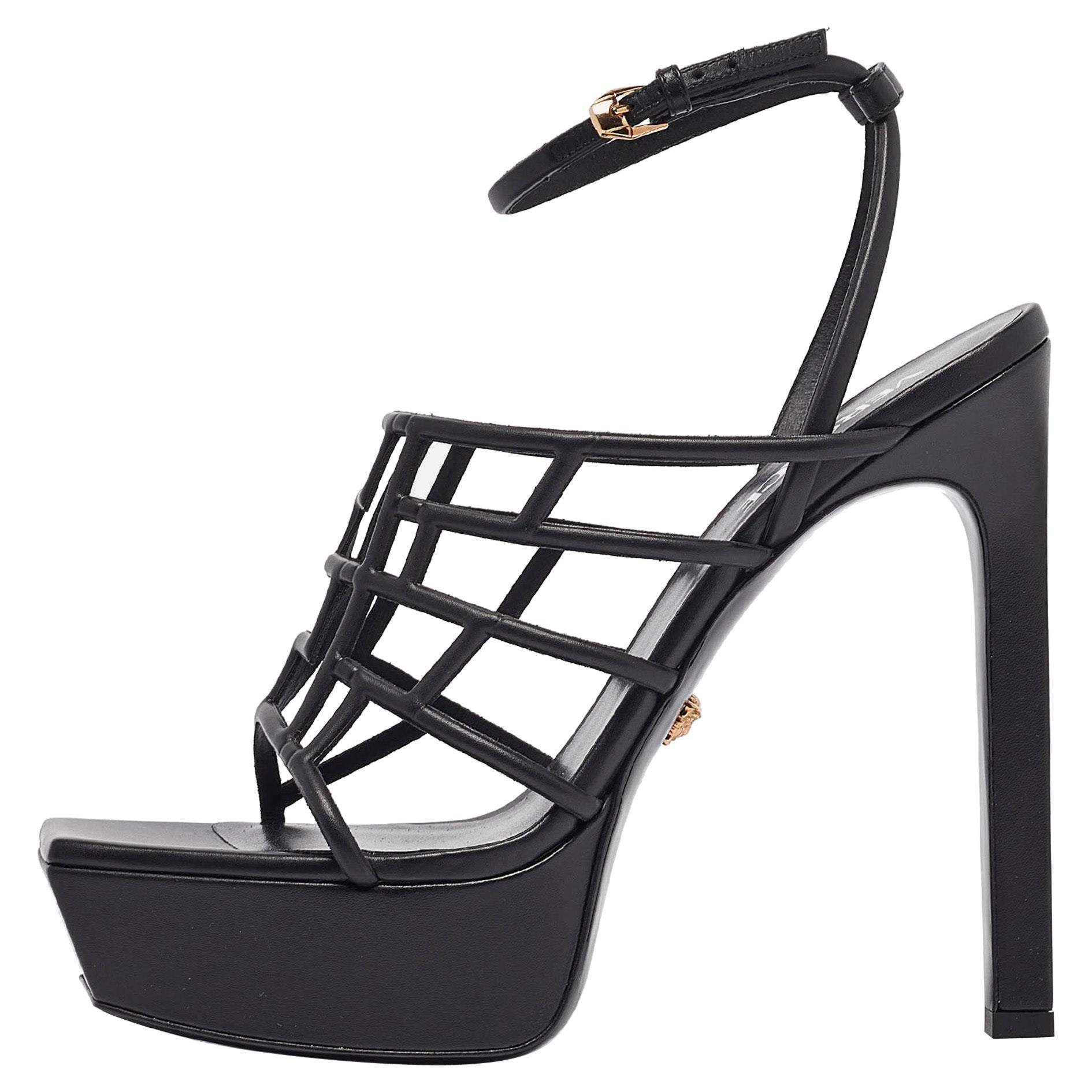 Sandalias con correa en el tobillo de piel negra Versace talla 41