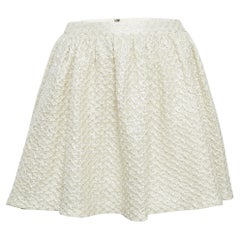 Alice + Olivia Minifalda de encaje de algodón con estampado metálico beige M