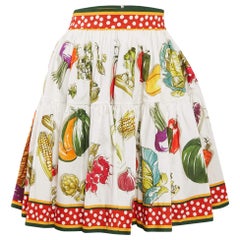 Dolce & Gabbana Minigonna a pieghe in bianco con stampa vegetale L.