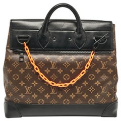 Louis Vuitton Borsa PM a vapore a raggio solare in pelle nera e tela Monogram