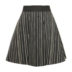Alice + Olivia Minifalda plisada de algodón a rayas negra M