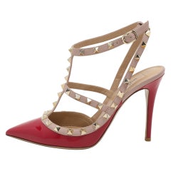 Bombas con correa al tobillo Rockstud de charol y piel rosa/beige de Valentino Talla 39