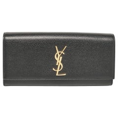 Saint Laurent Clutch Kate de piel negro