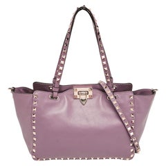 Valentino Tote piccola Rockstud a trapezio in pelle color malva