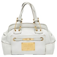 Dolce & Gabbana Cartera blanca de piel con marco y logotipo