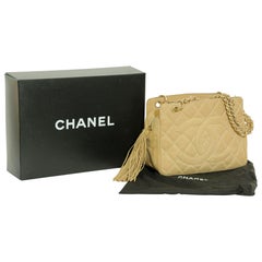 CHANEL Quilted Camel Suede Shoulder Bag with a Tassel