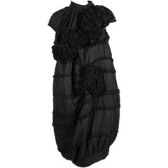 2006 COMME DES GARCONS 'tao' black dress with rosettes