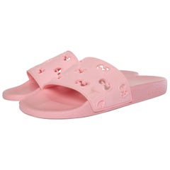 Gucci, rosa GG Slide-Sandalen aus Gummi