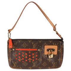 Louis Vuitton - Pochette in tela Monogram traforata arancione Accessoires