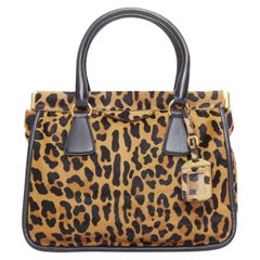 Bolso tote PRADA Vintage Cavallino marrón negro leopardo pelo de becerro marco dorado