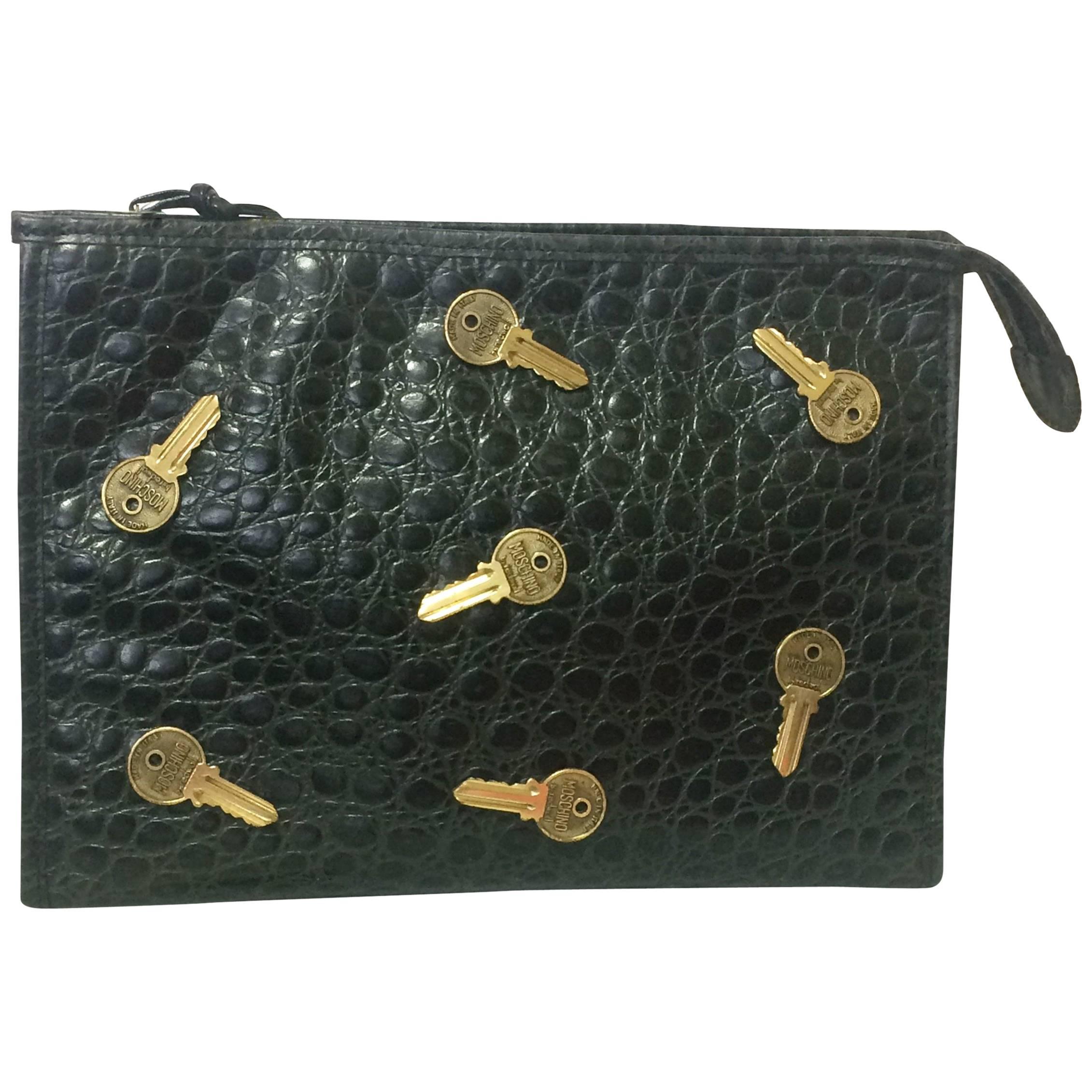 Vintage MOSCHINO classic croc-embossed black leather clutch bag with key logo