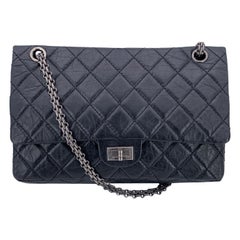 Chanel Borsa a tracolla con doppia patta in pelle nera Reissue 2.55 Large