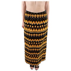 Maxi gonna in velluto di cotone geometrico arancione e marrone degli anni '70