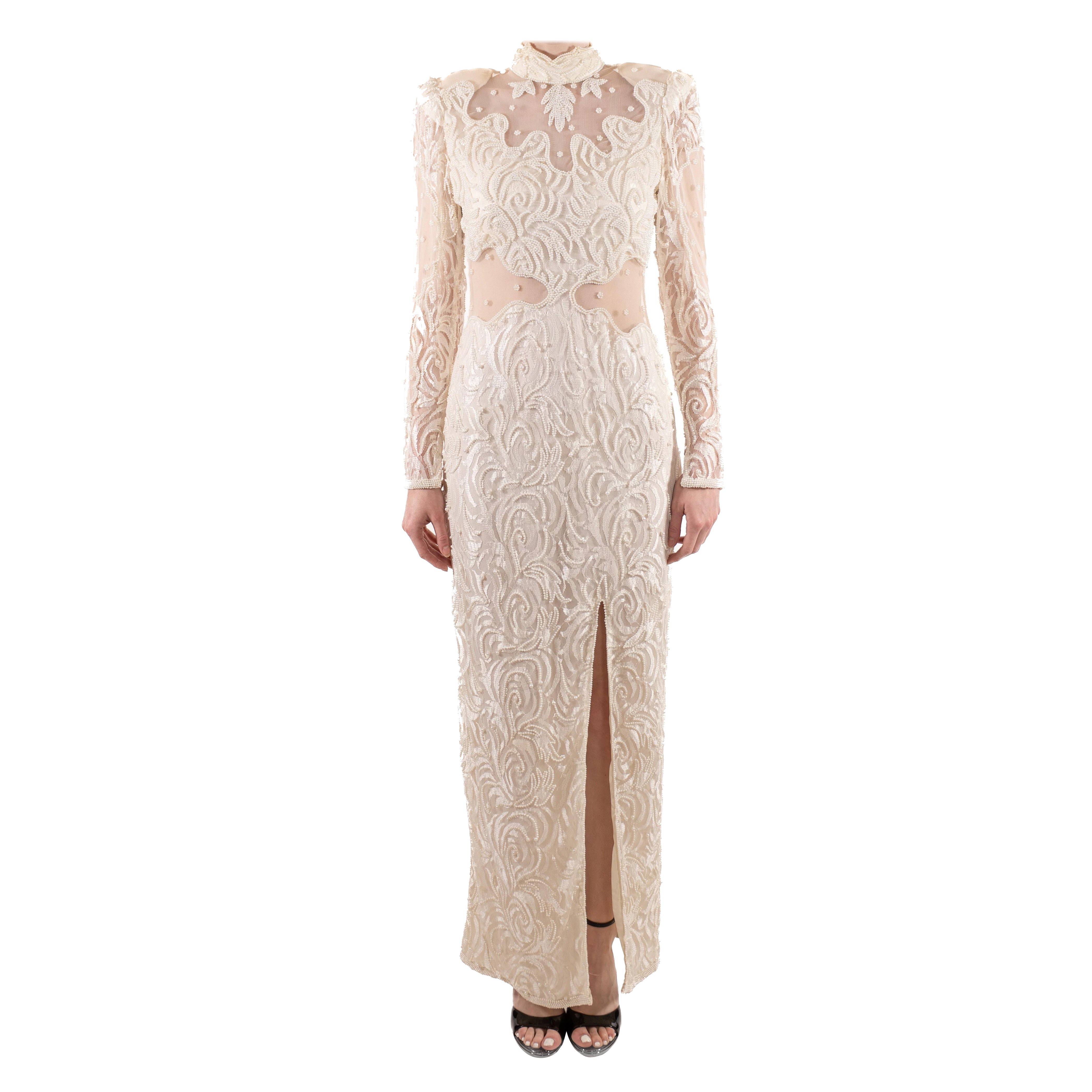 1980S Pearl White Slinky Beaded Lace Long Sleeved Gown With Sheer Panels For Sale