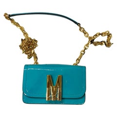 AW22 MOSCHINO Couture Jeremy Scott "M" Turquoise Metallic Patent Leather Bag