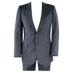 YVES SAINT LAURENT tailleur long en laine à rayures bleu marine à revers clouté taille 42