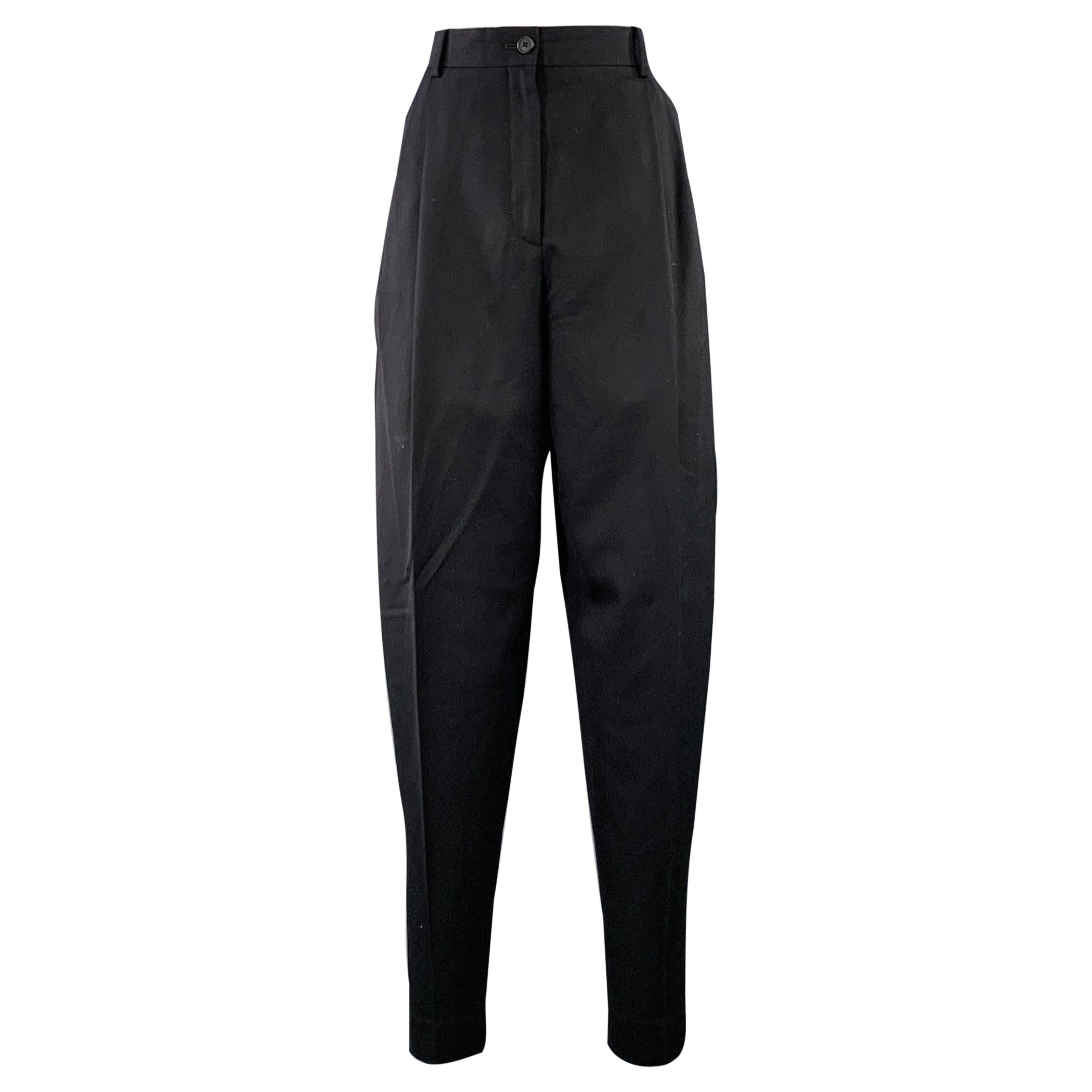 THE ROW Talla 0 Pantalones de vestir negros de lana virgen con pliegues y cremallera en la cintura en venta