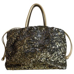 Bolso Dolce & Gabbana de lentejuelas doradas y plateadas