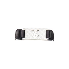 LOUIS VUITTON Champs Elysee black leather floral motif LV metal plate bracelet