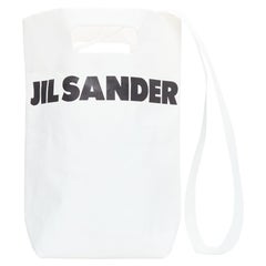 JIL SANDER borsa crossbody con logo in carta laminata nera e crema