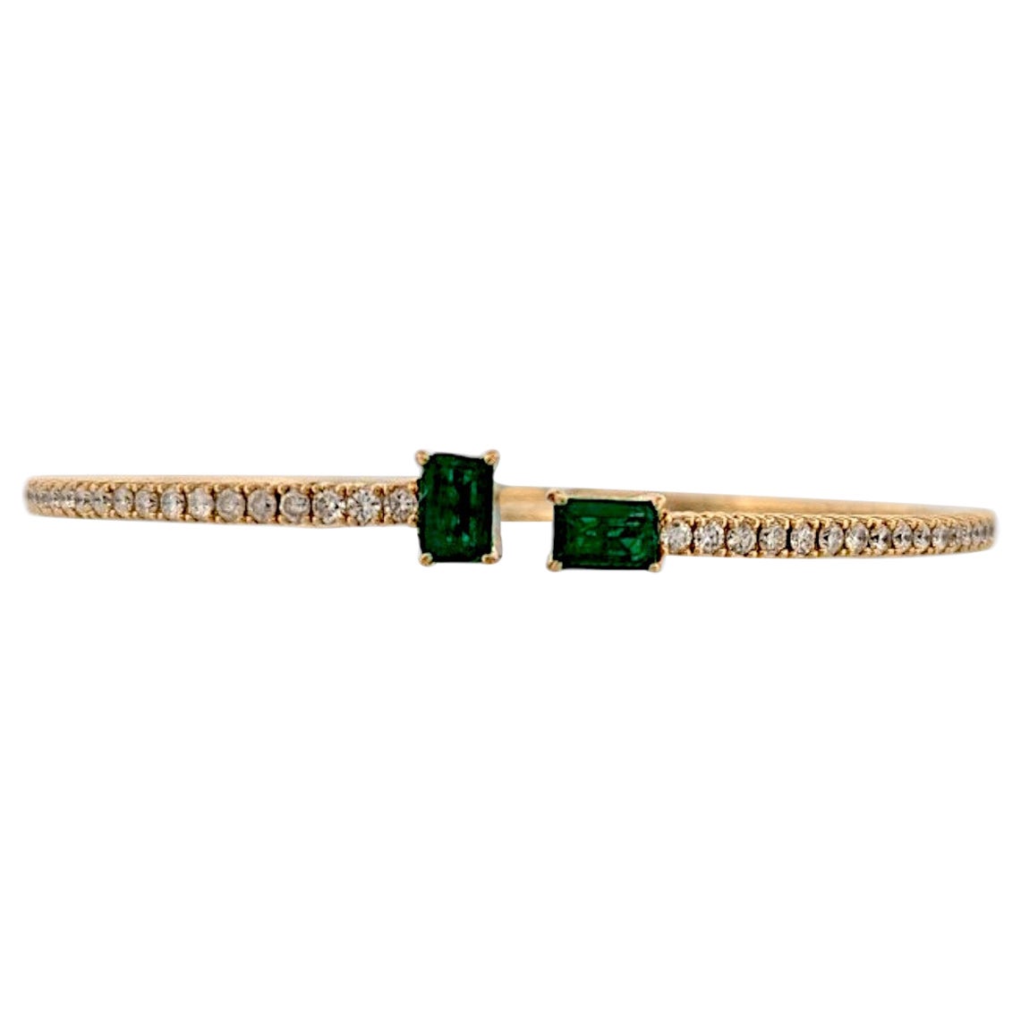 Goldie  Size 6"  14k Yellow Gold Flex Bangle with 1.50 ct Natural Emeralds For Sale